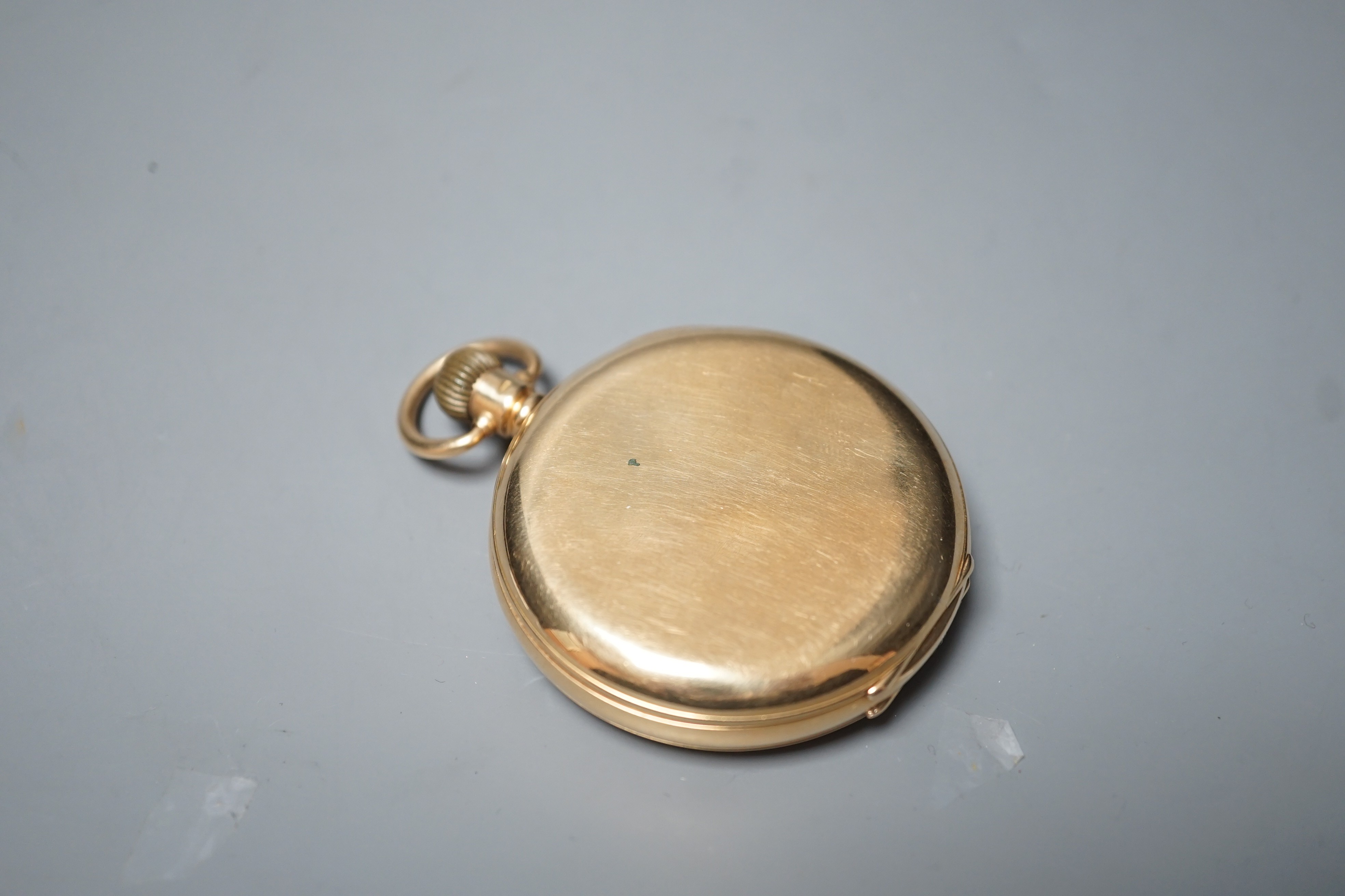 A George V 18ct gold Waltham open faced keyless pocket watch, with Arabic dial and subsidiary seconds, case diameter 50mm, gross weight 98.9 grams.